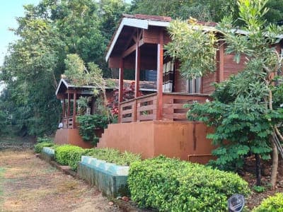 Two-storey wooden cottage with a garden in the Papikondalu hills